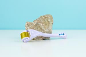 Skin and body care roller with microneedles