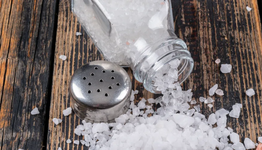 What are the symptoms of excess salt in the body and how to address it?